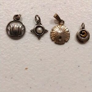 Set of 4 silver pendants EUC